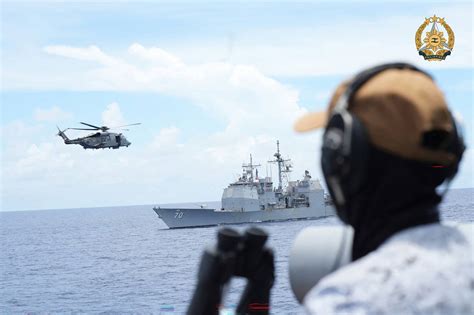 US offer to escort Philippine ships risks clashes with China.